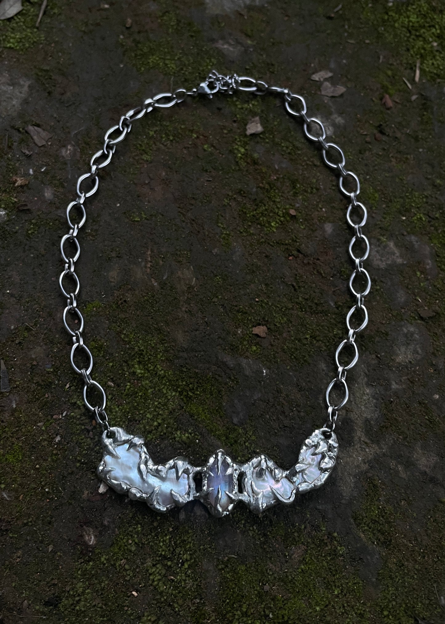 Crying angel necklace